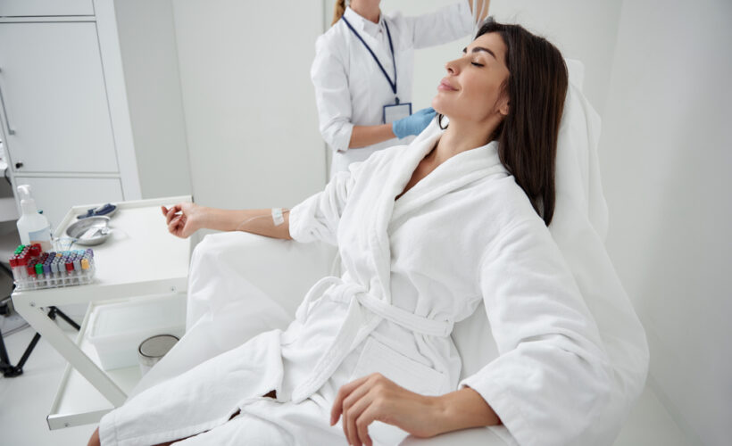 Woman receiving IV wellness treatment for natural healing in Solomons MD