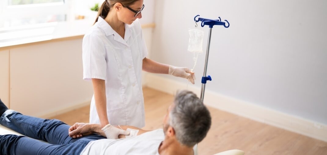 Provider preparing O3UV therapy for surgical recovery treatment