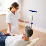 Provider preparing O3UV therapy for surgical recovery treatment