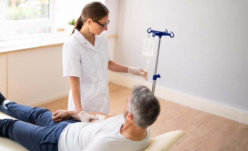 Provider preparing O3UV therapy for surgical recovery treatment