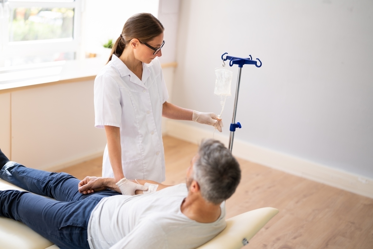 Provider preparing O3UV therapy for surgical recovery treatment