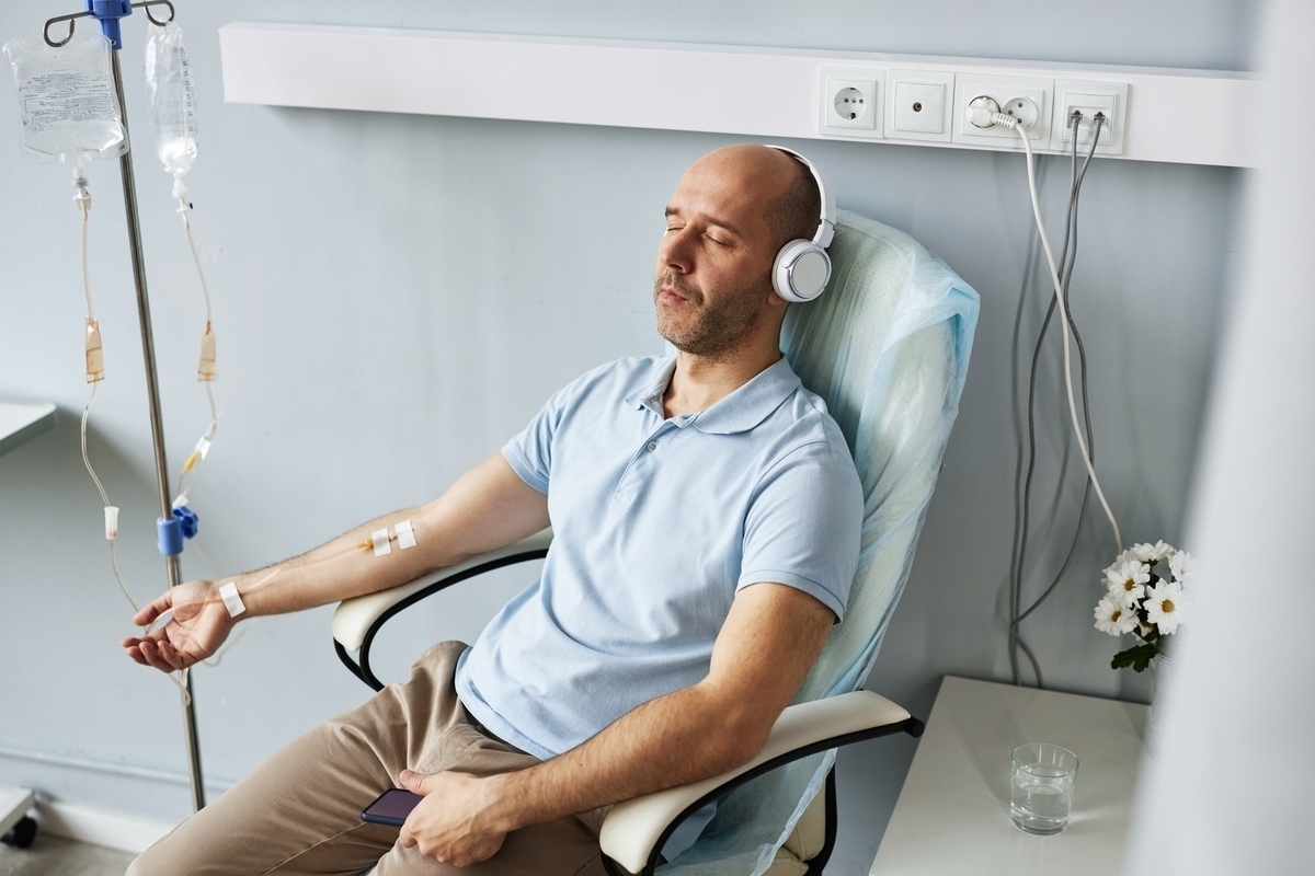 Person relaxing during ozone therapy for muscle soreness treatment