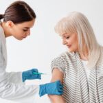 ozone therapy for autoimmune disease — provider administering treatment to an older female patient